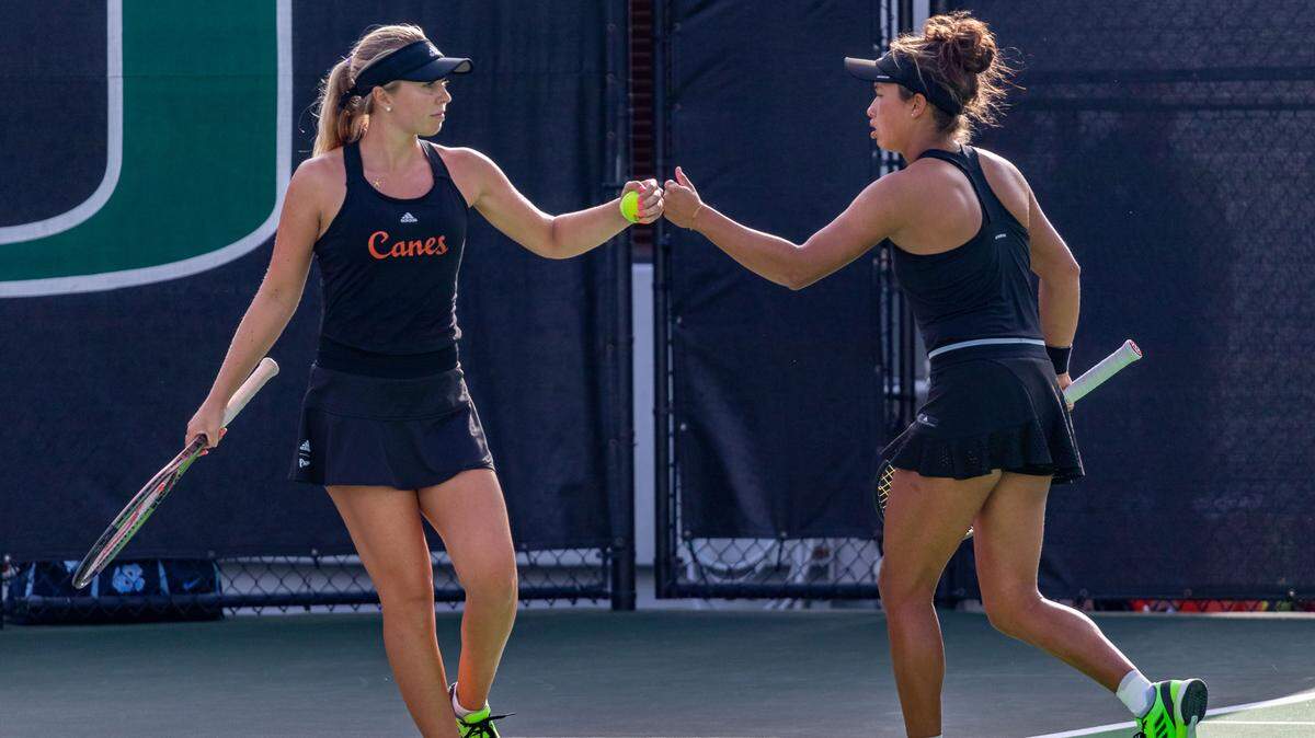 University of Miami fifth-year senior Eden Richardson (left) and fourth-year junior Daevenia Achong were ranked 13th nationally in doubles tennis going into the 2022 NCAA women’s team tournament.