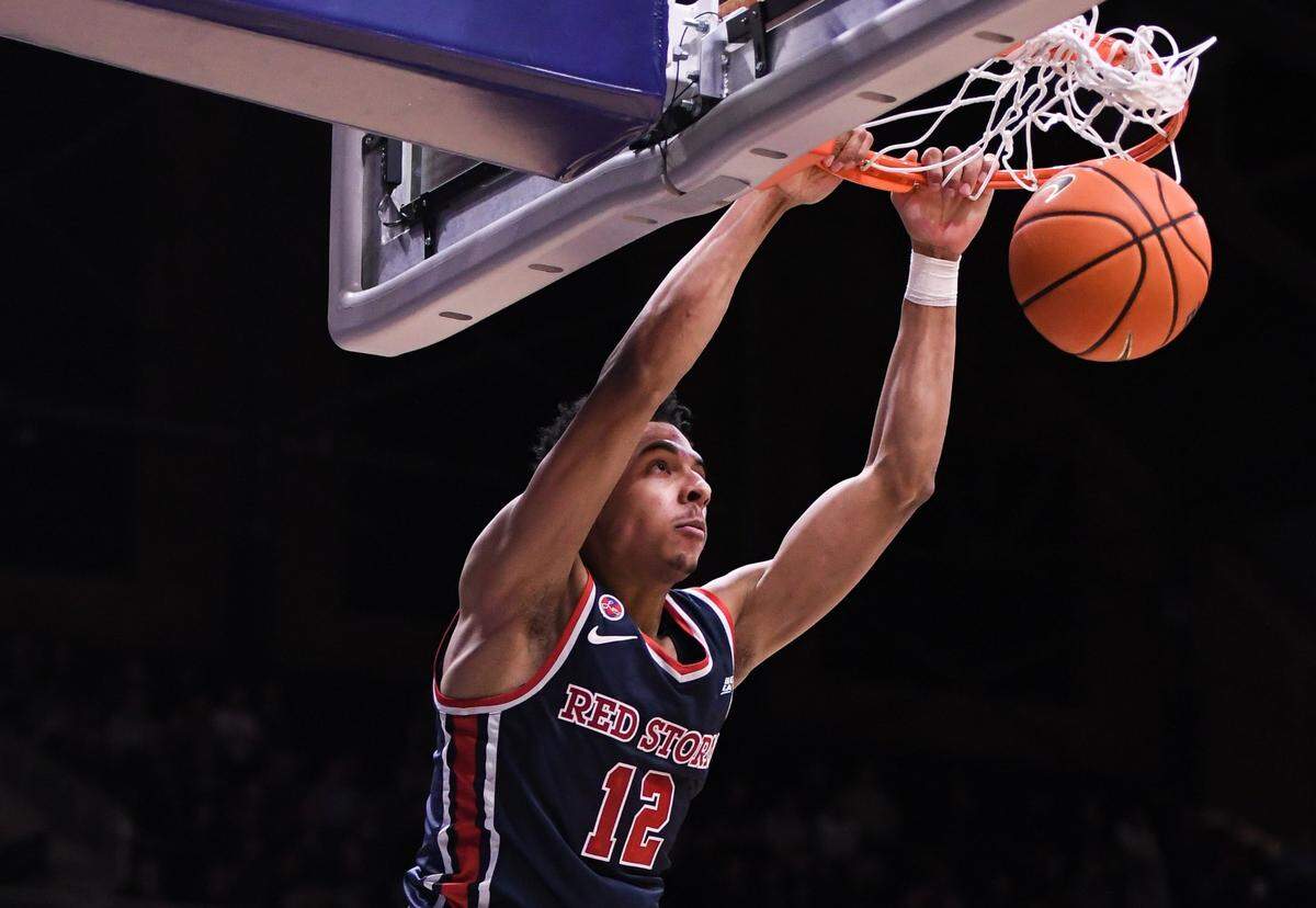 Feb 26, 2025; Indianapolis, Indiana, USA; St. John’s Red Storm guard RJ Luis Jr. (12) dunks the ball during the second half against the Butler Bulldogs at Hinkle Fieldhouse. Mandatory Credit: Robert Goddin-Imagn Images