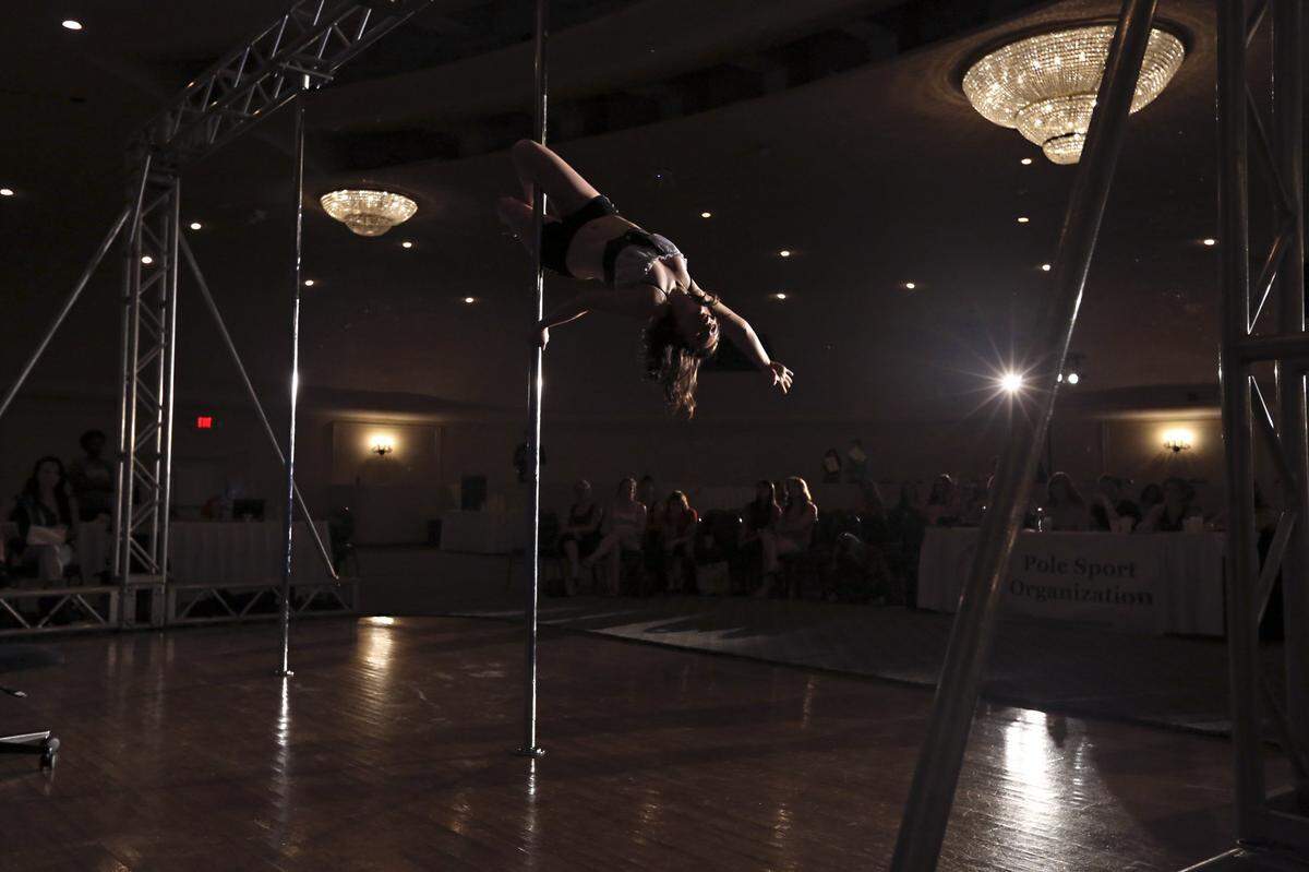 A competitor in the Southern Pole Championships at the Deauville Beach Resort in Miami Beach in May 2013.