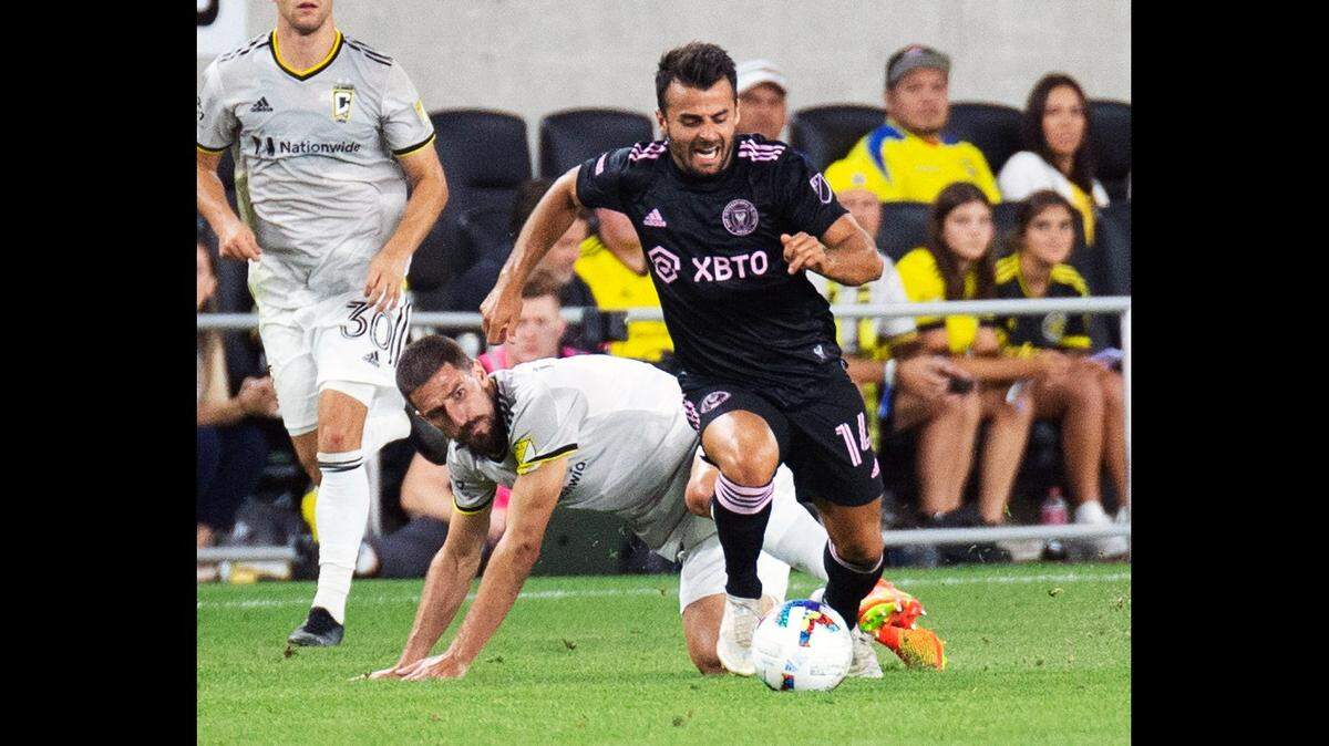 August 31, 2022: Inter Miami forward Corentin Jean (14) goes around Columbus Crew defender Milo Degenek (5) in their match in Columbus, Ohio.