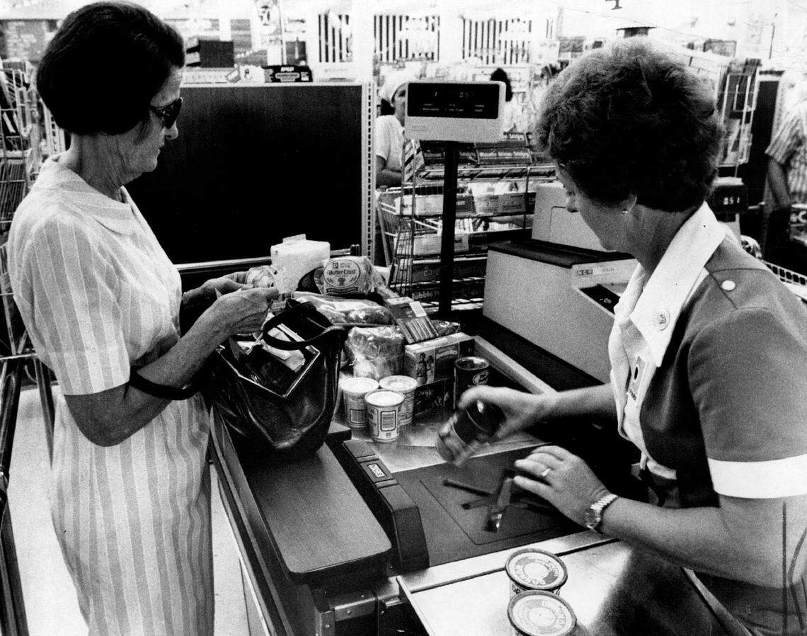 Customer and cashier at a Publix at Biscayne Boulevard and Northeast 90th Street in Miami Shores.