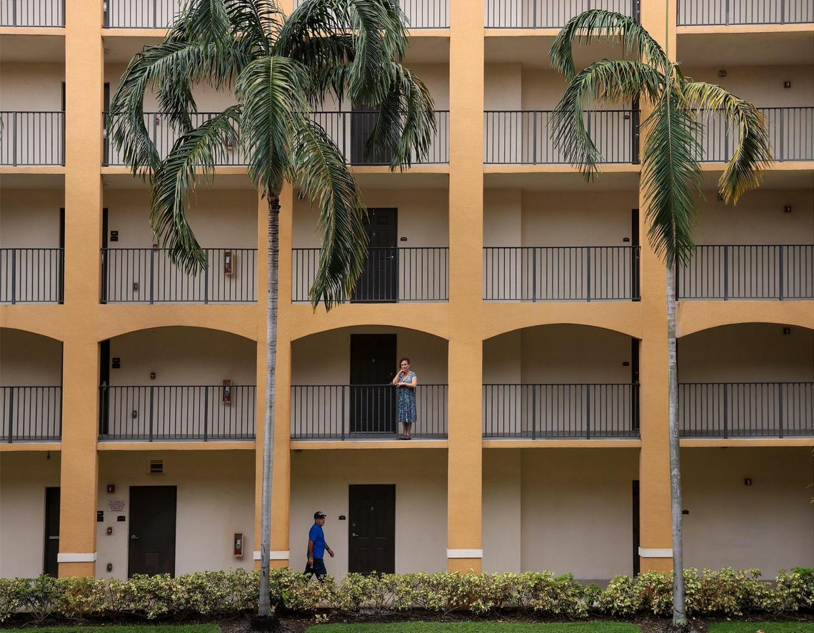 Aurora Ruiz Cortez, 78, moved from Li’l Abner Mobile Home Park to the Li’l Abner I apartment complex following her husband’s death. Cortex glances over the courtyard on Thursday, Sept. 15, 2022.