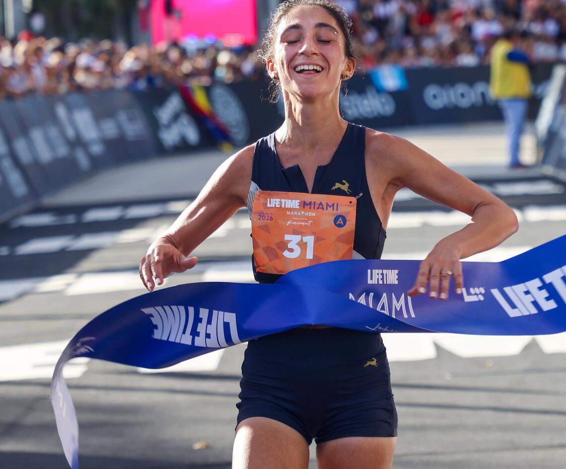 Christina Welsh, 29, crosses the finishing line to win the Women's Elite Life Time Miami Marathon on Sunday, January 25, 2026, in Miami, Florida.