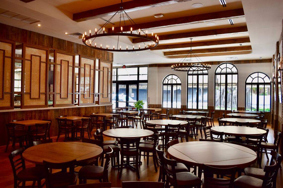 Walls of the new Perricone’s restaurant include wood reclaimed from the original restaurant — which came from a 1700s Vermont barn.