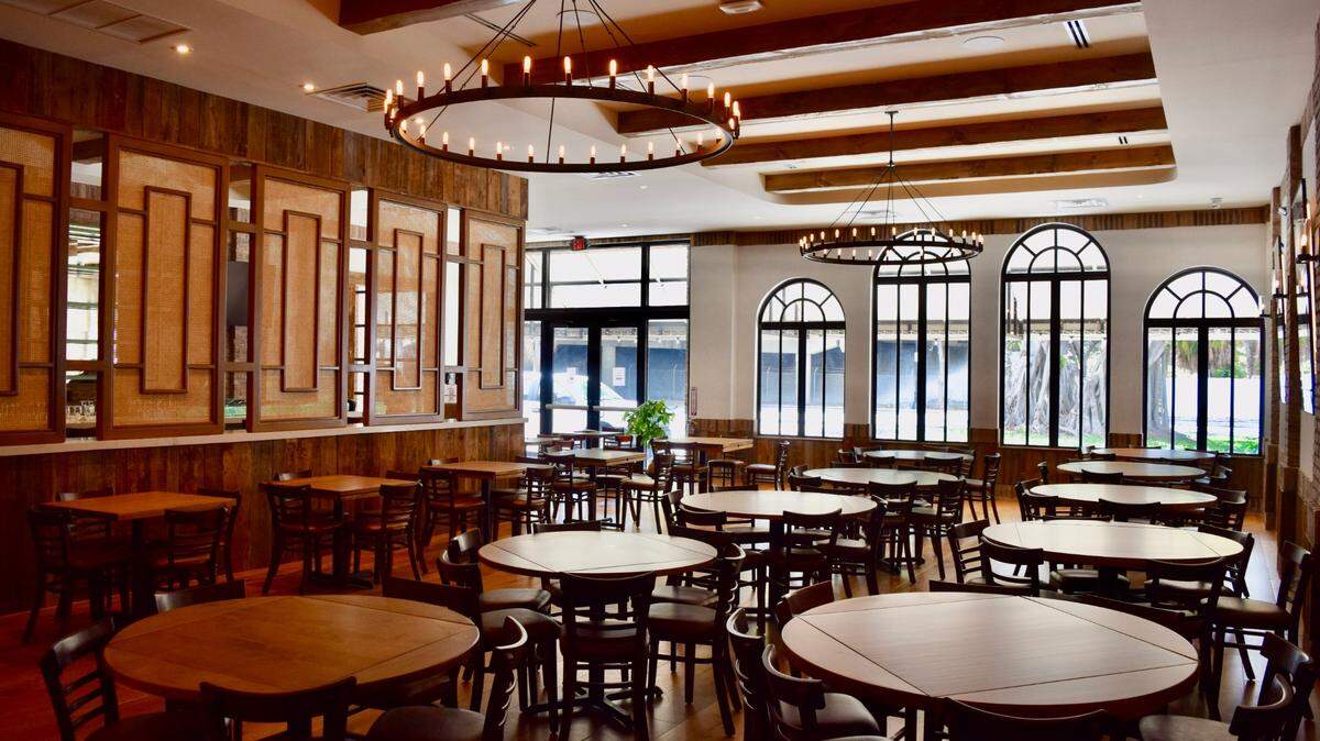 Walls of the Perricone’s restaurant that opened in 2020 include wood reclaimed from the original restaurant — which came from a 1700s Vermont barn.