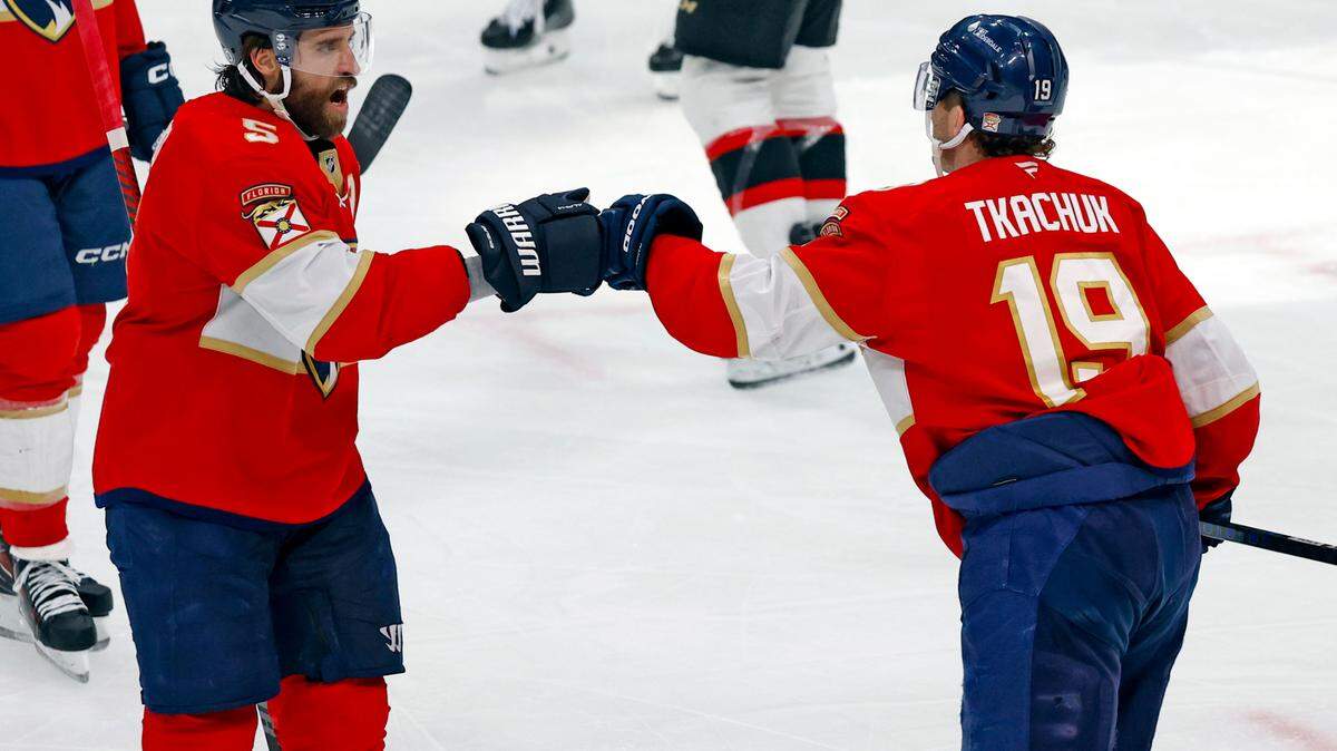 Florida Panthers left wing Matthew Tkachuk (19) celebrates with Florida Panthers defenseman Aaron Ekblad (5) after Tkachuk scores against the Ottawa Senators in the second period during their NHL Hockey match at Amerant Bank Arena in Sunrise, Florida on Saturday, February 8, 2025.