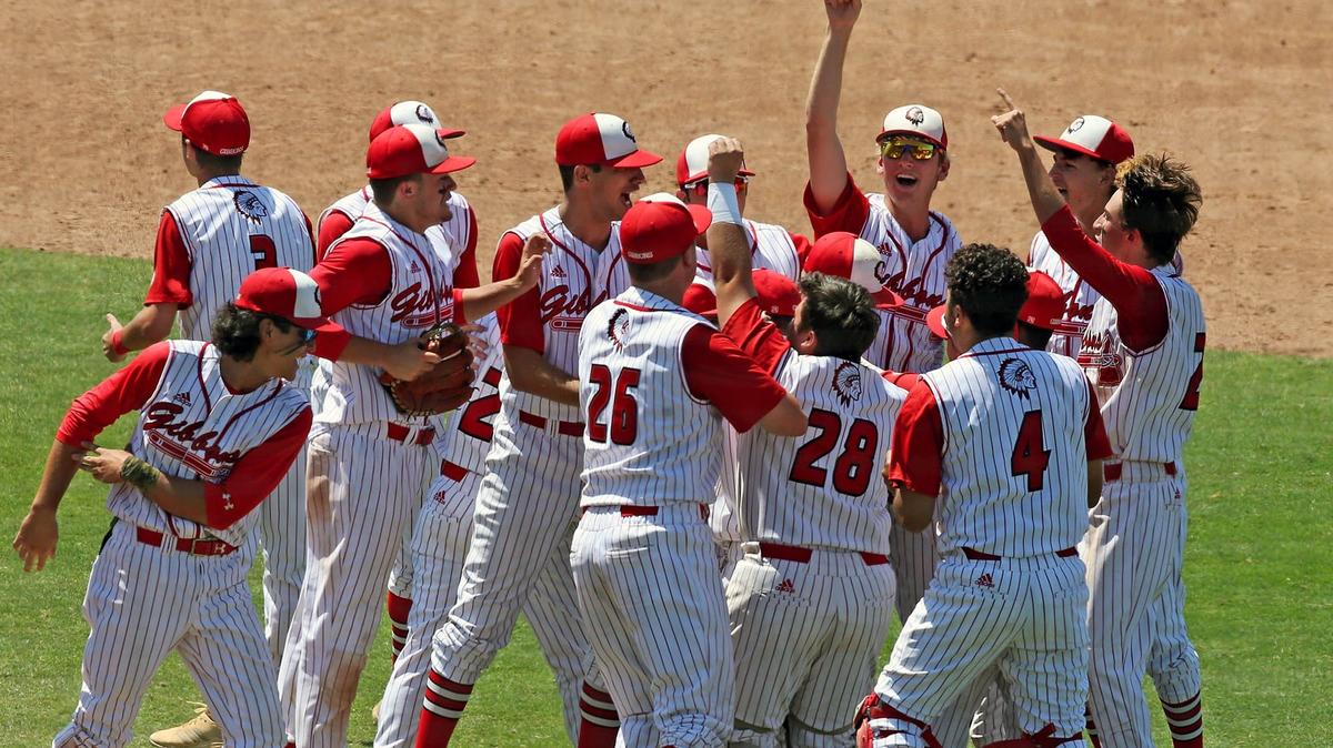 Cardinal Gibbons players celebrate as they defeat Bishop Moore Catholic in the FHSAA Semi-Finals Class 5 Division at CenturyLink Sports Complex - Hammond Stadium in Fort Myers, Florida, Wednesday, May, 29, 2019.