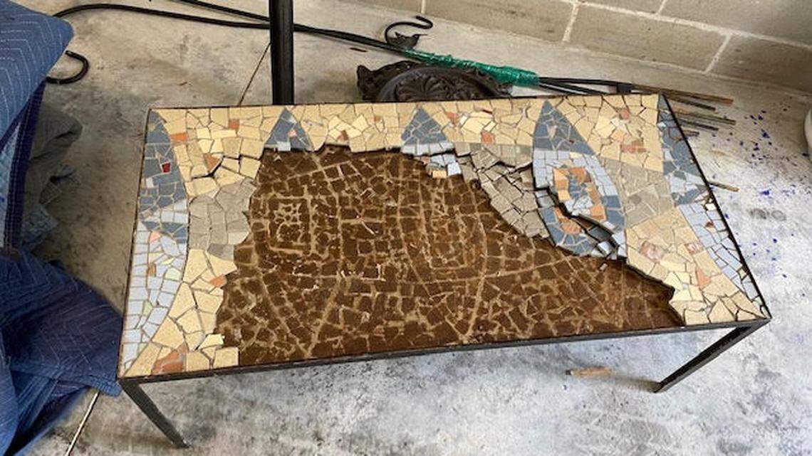 The Rosenfields say this table was broken during the move.