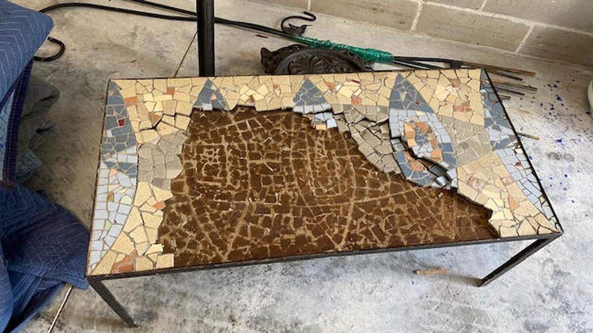 The Rosenfields say this table was broken during the move.