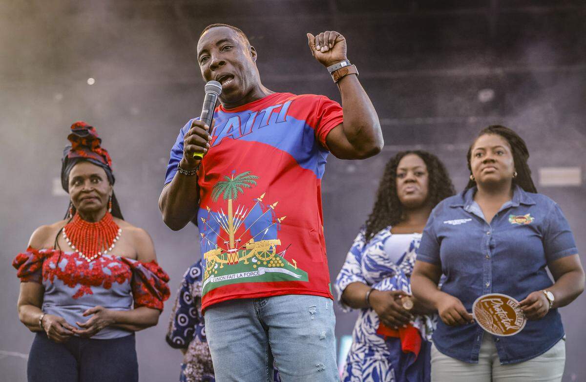 North Miami Councilman Pierre Frantz Charles speaks during the 28th Annual Haitian Compas Festival at The NoMI Village celebrating Haitian Flag Day, in North Miami, Florida  on Saturday, May 16, 2026.