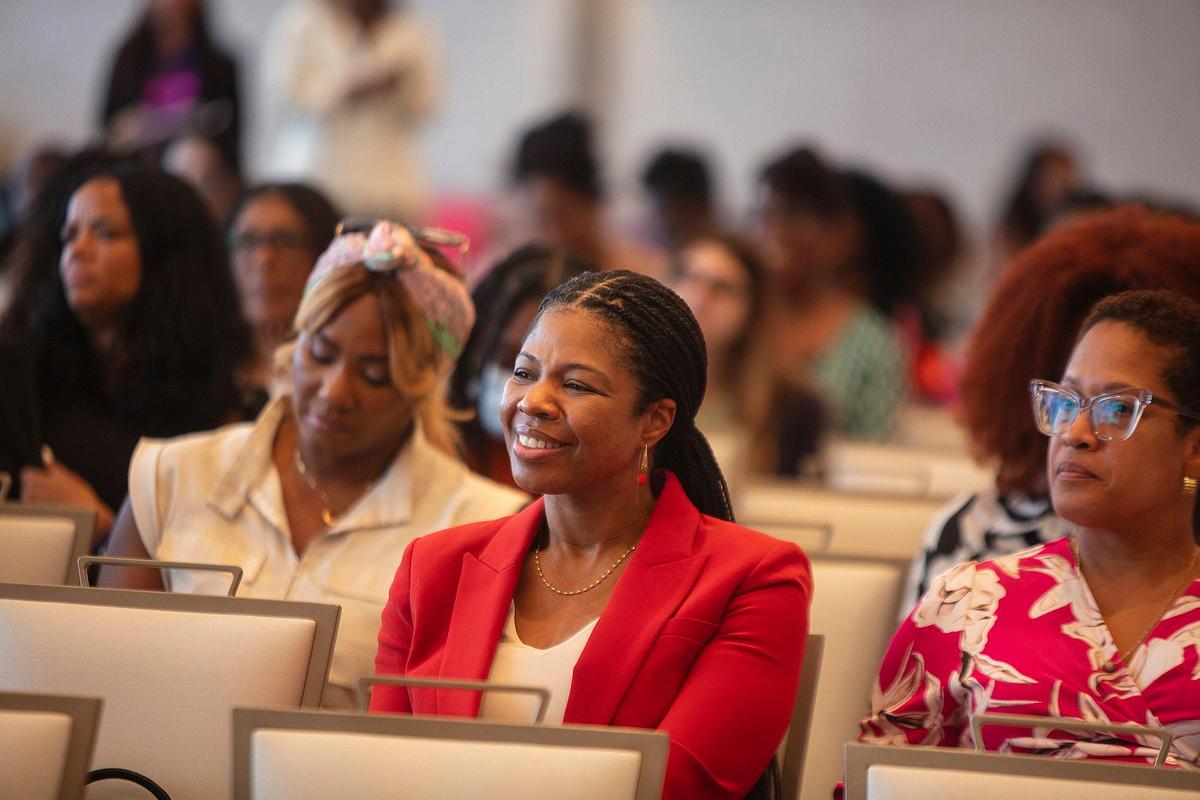Joy Butts (center) smiles among attendees at the Business Leaders of Color event during the ColorComm Conference, held at the Fontainebleau on Wednesday, July 23, 2025.