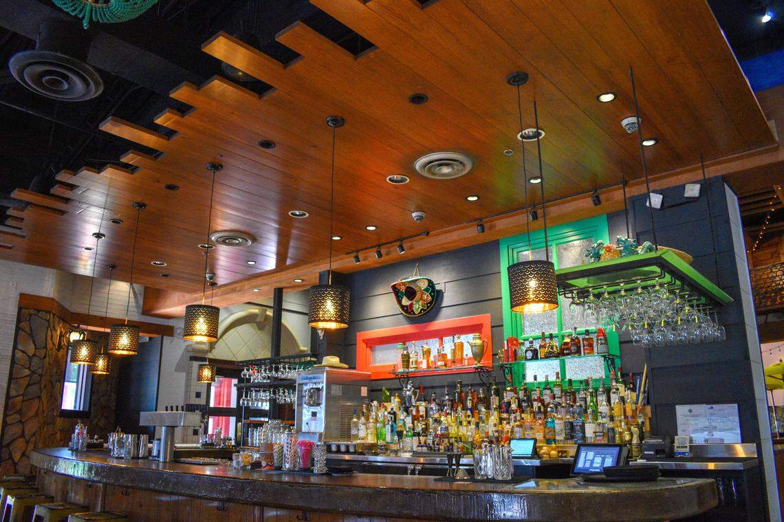 Cafe La Trova’s Julio Cabrera, whose Little Havana bar has won several awards, handles the bar at Chela’s Beer Garden in Miami Lakes.