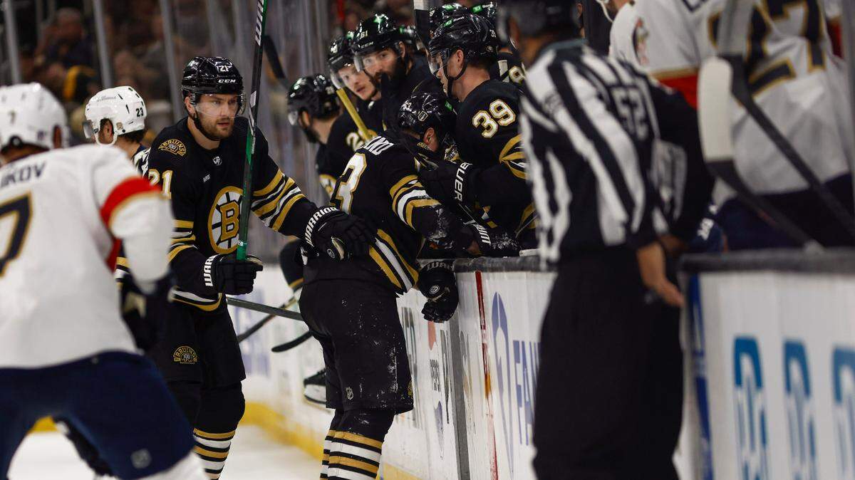 May 10, 2024; Boston, Massachusetts, USA; Boston Bruins left wing Brad Marchand (63) struggles to get to the bench after being hit during the first period of game three of the second round of the 2024 Stanley Cup Playoffs against the Florida Panthers at TD Garden.