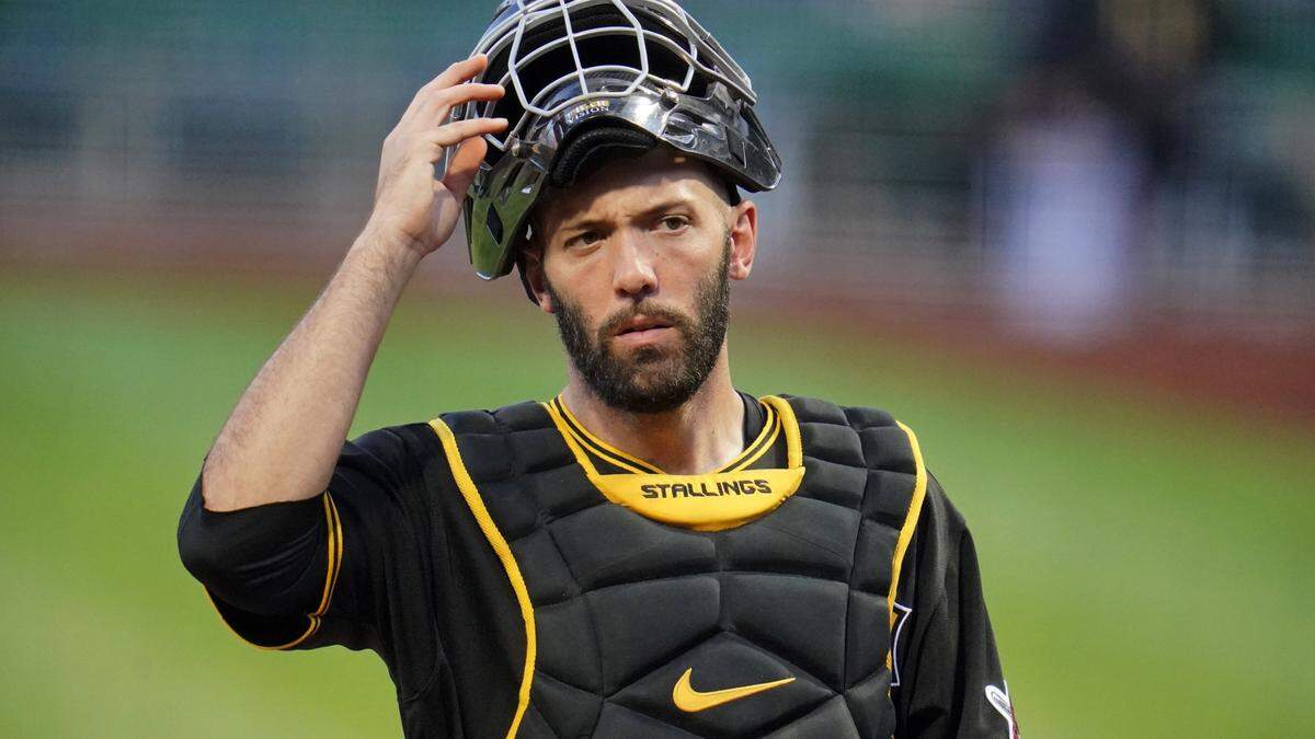 Pittsburgh Pirates catcher Jacob Stallings catches during a baseball game against the Chicago Cubs in Pittsburgh, Tuesday, Sept. 28, 2021. The Pirates won 8-6.