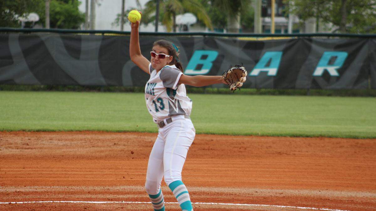 Coral Reef pitcher Briana Romaguera lets one fly during the first inning of Tuesday afternoon’s Region 4-9A semifinal against Palmetto. Romaguera fired a two-hit shutout to lead her team to a 10-0, six-inning mercy rule victory.