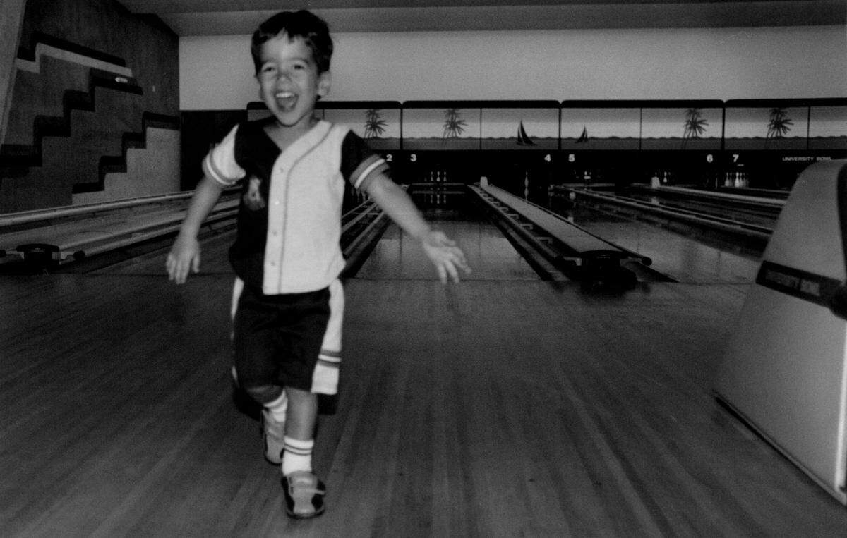 In 994, a day of youth bowling at University Bowl in Davie. Justin Padilla, 2 of Pembroke Pines, cheers after his turn.