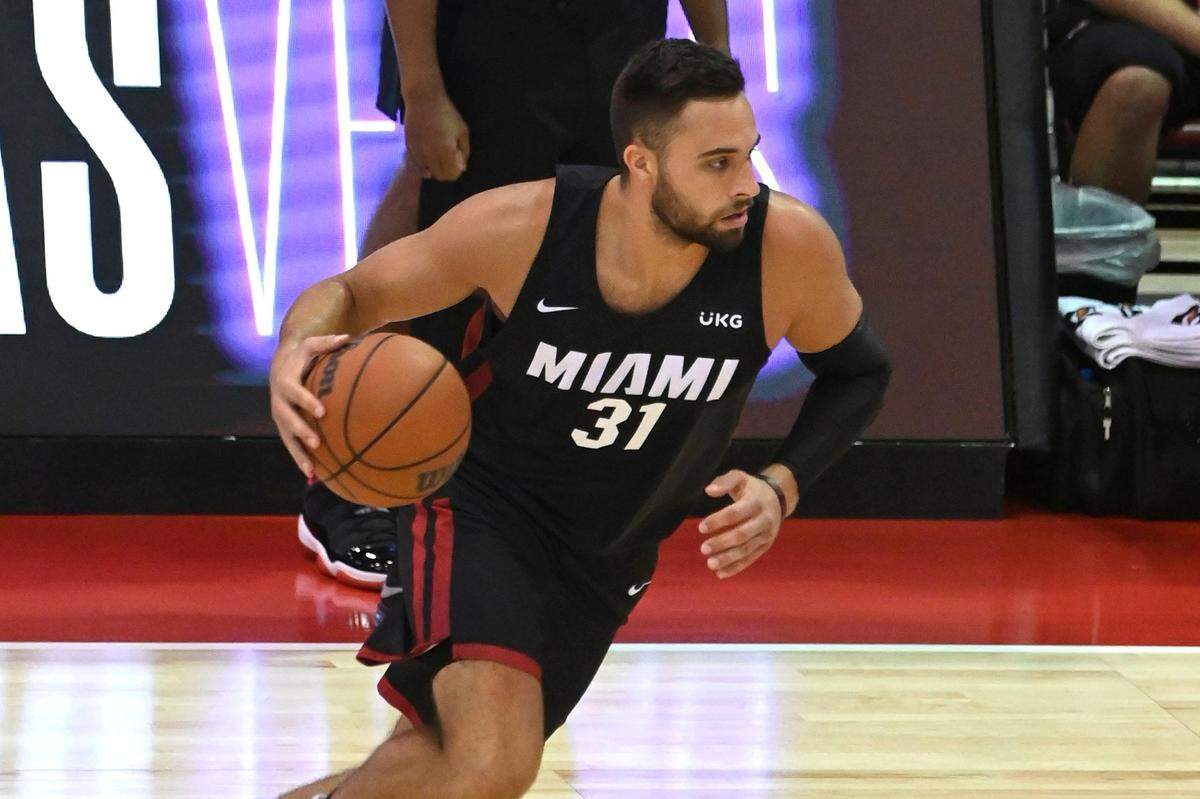 Miami Heat guard Max Strus (31) drives the ball during the first half of an NBA summer league basketball game against the Utah Jazz on Friday, Aug. 13, 2021, in Las Vegas.