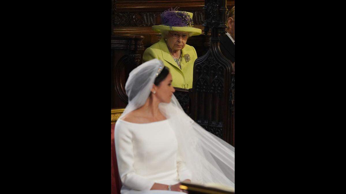 Queen Elizabeth II and the Duchess of Sussex during their wedding in 2018.