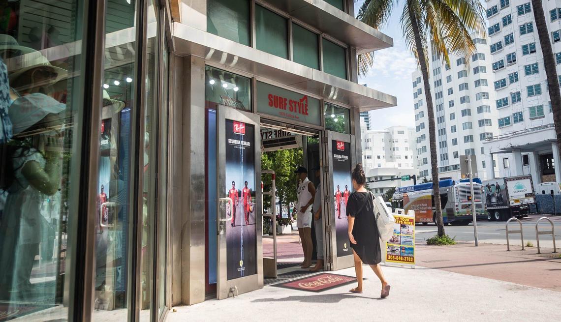 A woman enters Surf Style on Collins Avenue across the street from the Sagamore hotel, an area in Miami Beach that could see a major makeover in a controversial expansion plan goes through.