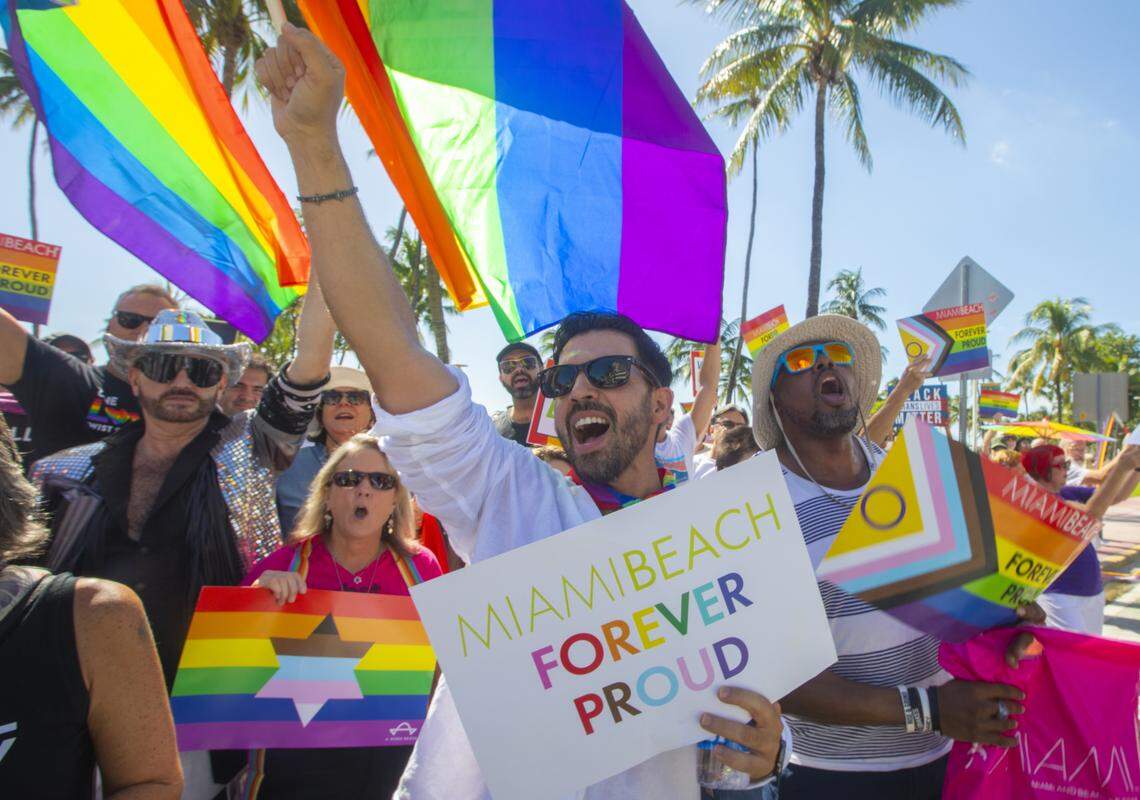 Eddie Mart rallies with demonstrators carrying rainbow flags and signs reading ‘Miami Beach Forever Proud’ and ‘Won’t Be Erased’ during the Forever Proud March on Ocean Drive in Miami Beach, Fla., Sunday, Aug. 31, 2025. The march was held after state officials ordered the removal of the city’s LGBTQ Pride crosswalk.