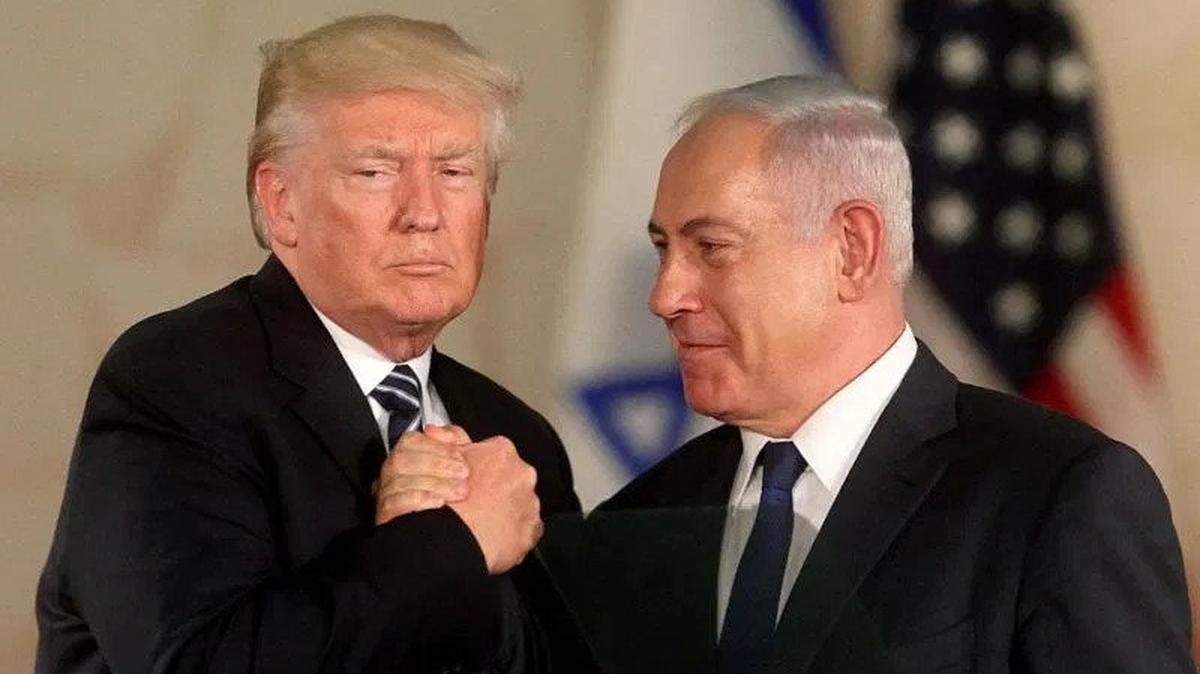 President Trump and Israeli Prime Minister Benjamin Netanyahu clasp hands at the Israel Museum in Jerusalem in 2017.