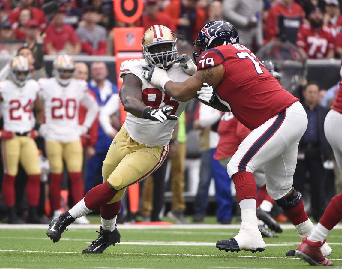 San Francisco 49ers defensive end Tank Carradine (95) and Houston Texans offensive guard Jeff Allen (79) during an NFL football game Sunday, Dec. 10, 2017, in Houston.