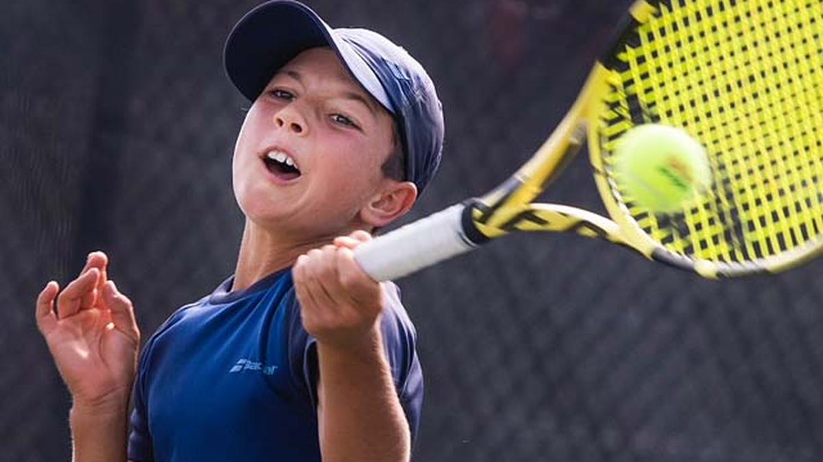 Teodor Davidov hits left-handed at the Junior Orange Bowl International Tennis Championships Boys’ 12 and under on Dec. 18, 2021.