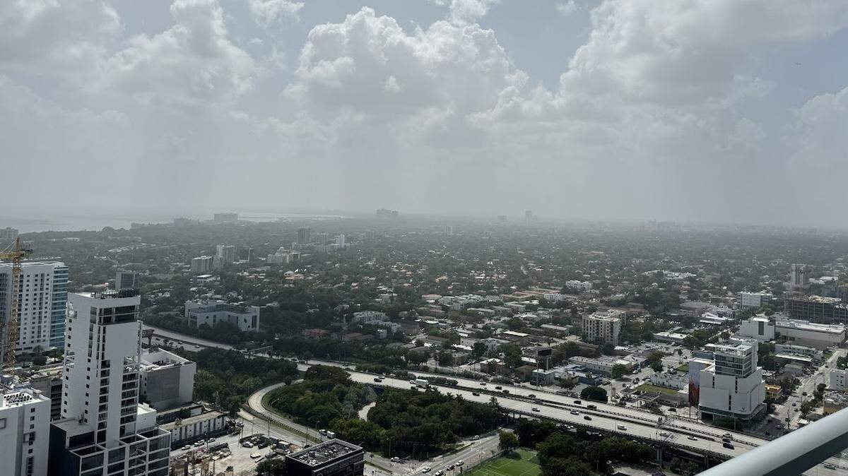 Hazy skies and “unhealthy” air quality in Miami-Dade, Broward are a result of Canadian wildfire smoke invading. It may affect residents.