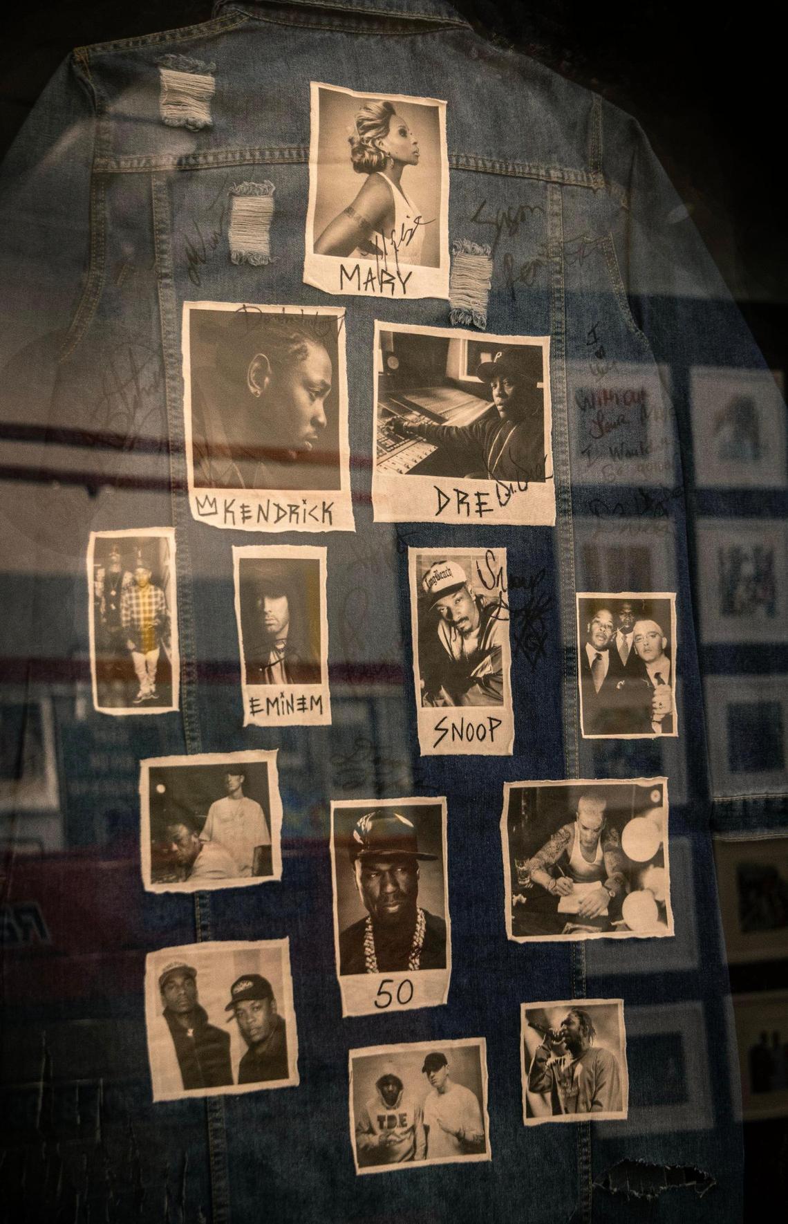 Fashion and portraits occupy the same space in the display paying homage legendary hip-hop performers.