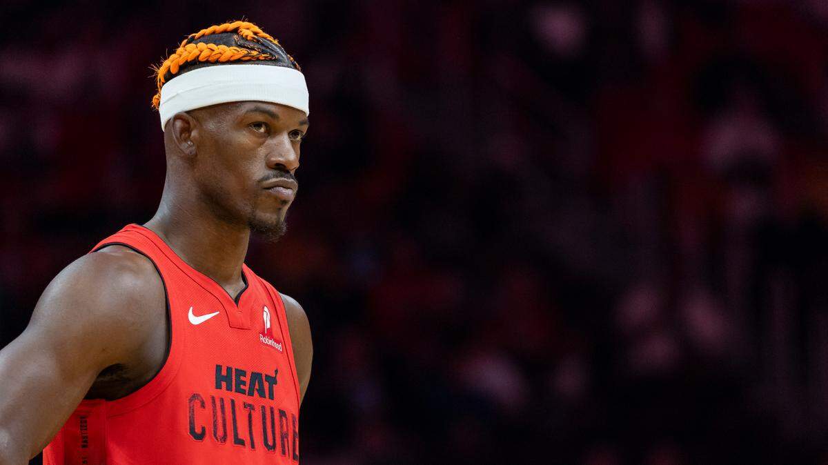 Miami Heat forward Jimmy Butler (22) looks on while playing against the Toronto Raptors in the first half of their NBA game at Kaseya Center on Dec. 12, 2024, in Miami.