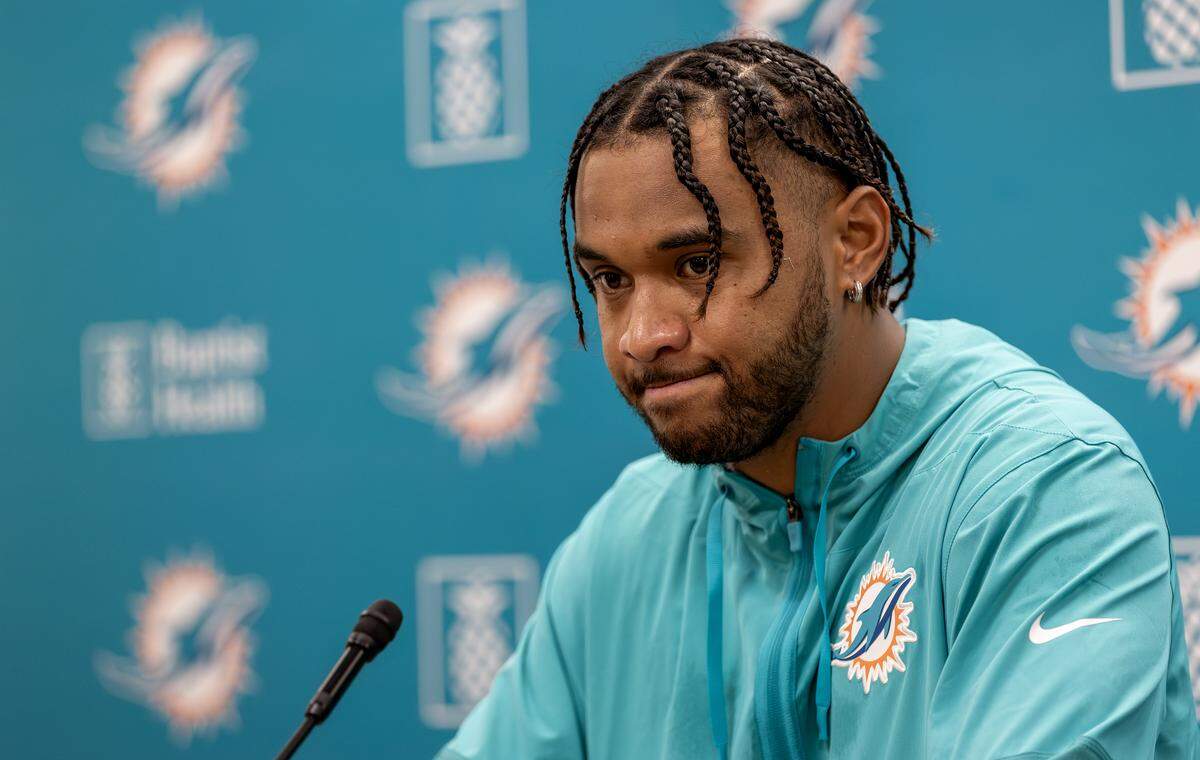 Miami Dolphins quarterback Tua Tagovailoa (1) speaks with reporters after practice at the Baptist Health Training Complex on Thursday, Sept. 25, 2025, in Miami Gardens, Fla.