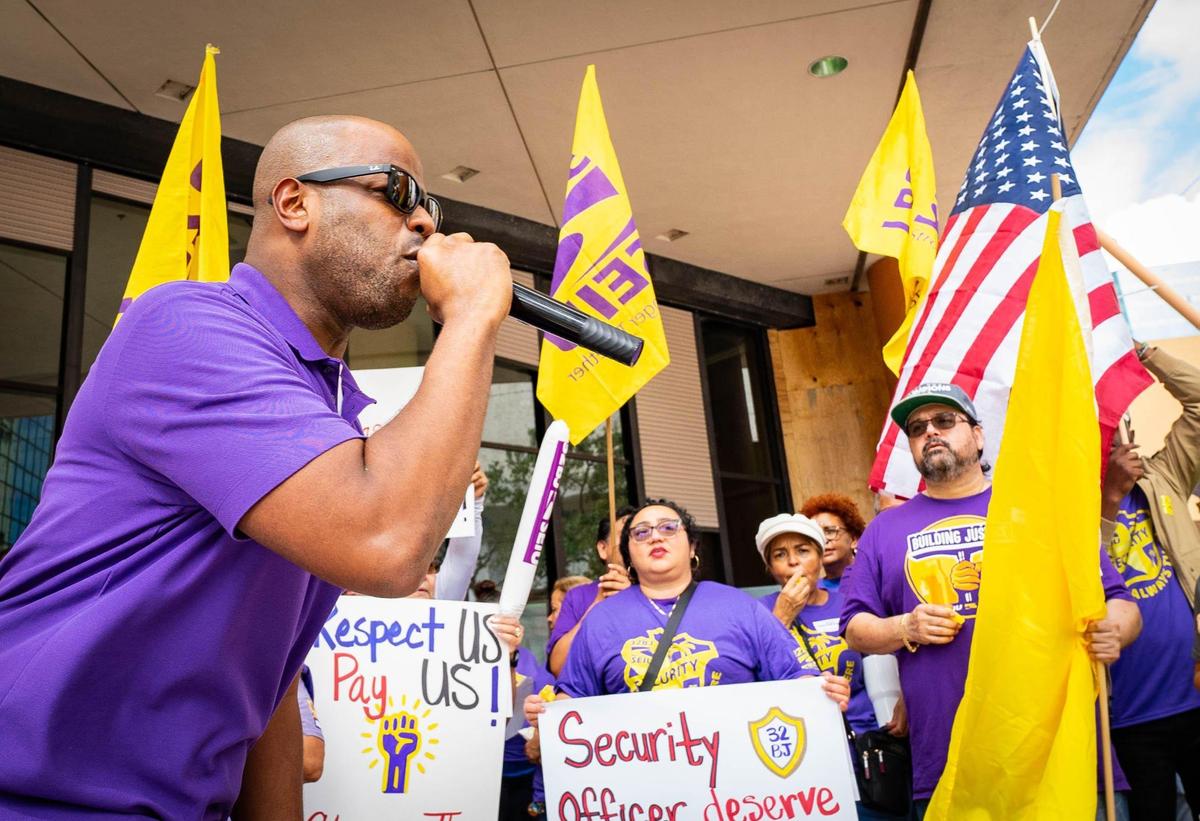 District leader Andy Cabrera of 32BJ SEIU energizes protesters rallying for a new union contract outside the Broward Government Center in Fort Lauderdale on Tuesday, Nov. 12, 2024.