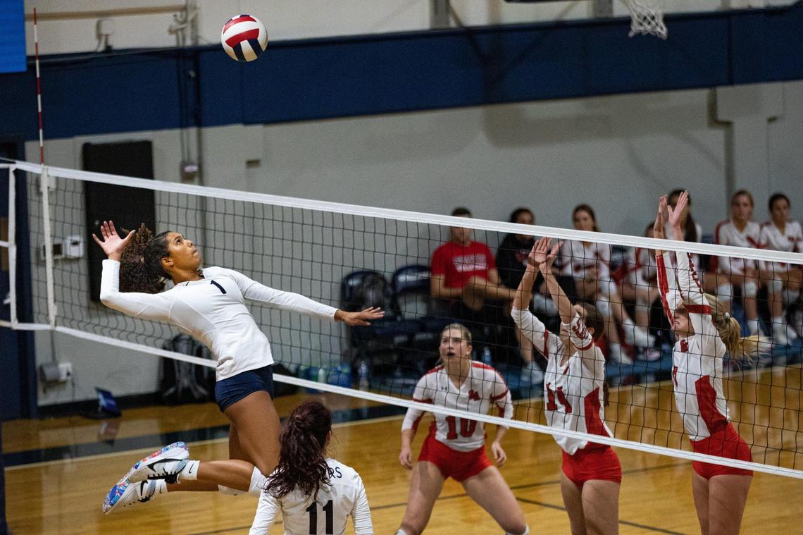 Gulliver Prep volleyball middle blocker Jackie Taylor (1) hits the ball over the net during a game against Saint Andrew’s at Gulliver Prep School in Pinecrest, Florida on Monday, October 3, 2022.