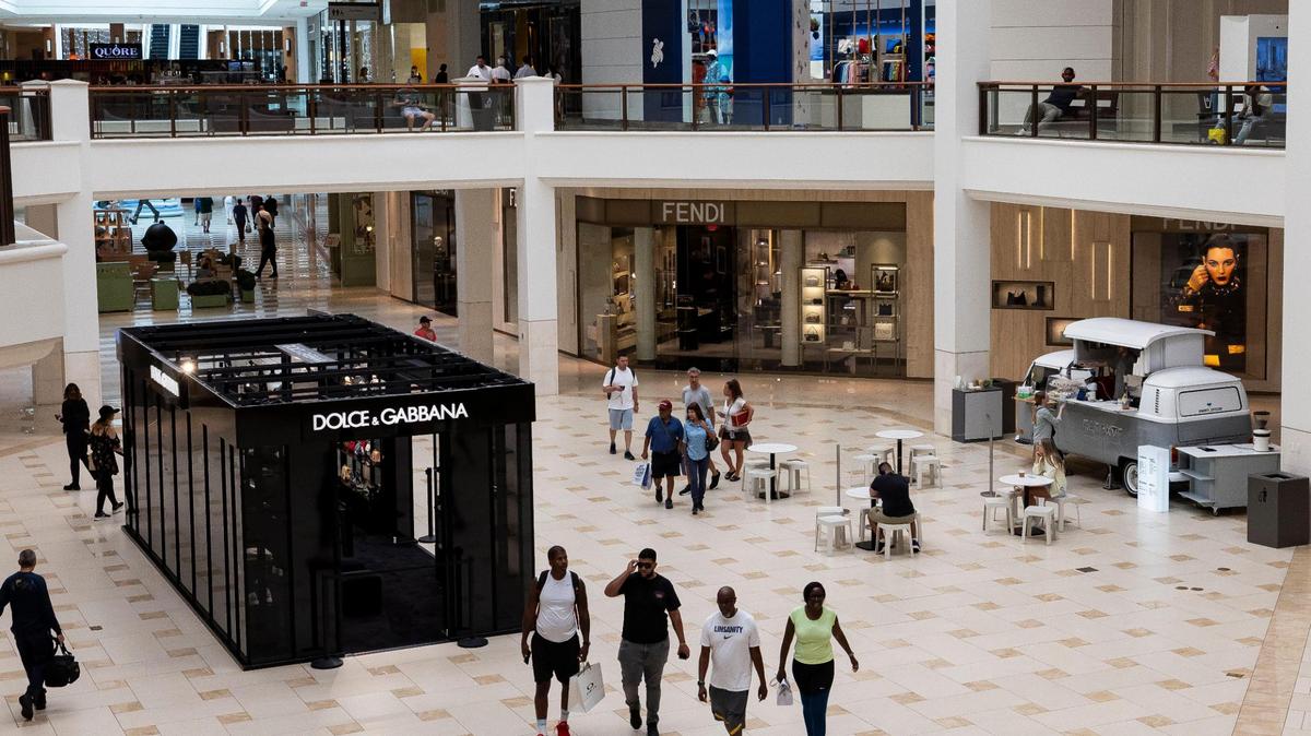 Third places offer opportunity for connection, but only if we choose to put our phones down. People at Aventura Mall, a third place, Sept. 25, 2024. 
