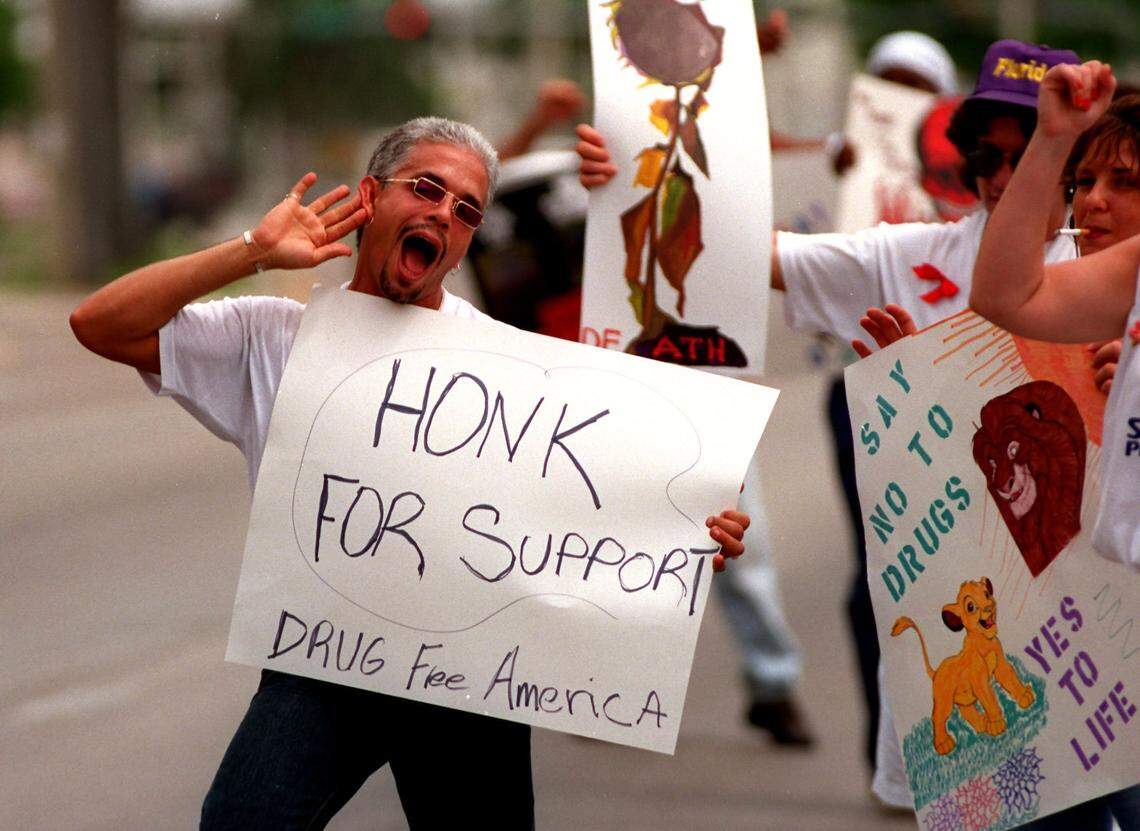 In 1995, a drug-free rally in downtown Miami featuring a honk sign.