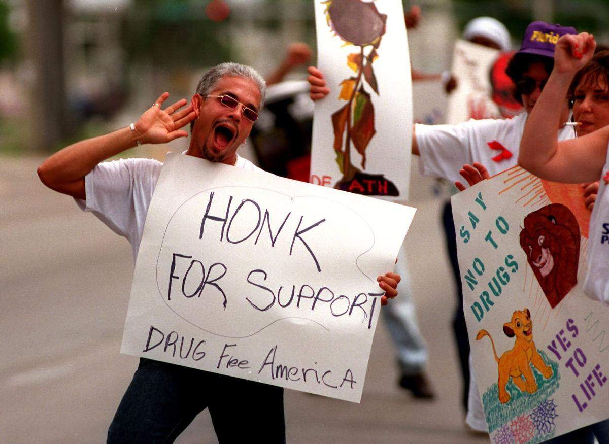 In 1995, a drug-free rally in downtown Miami featuring a honk sign.