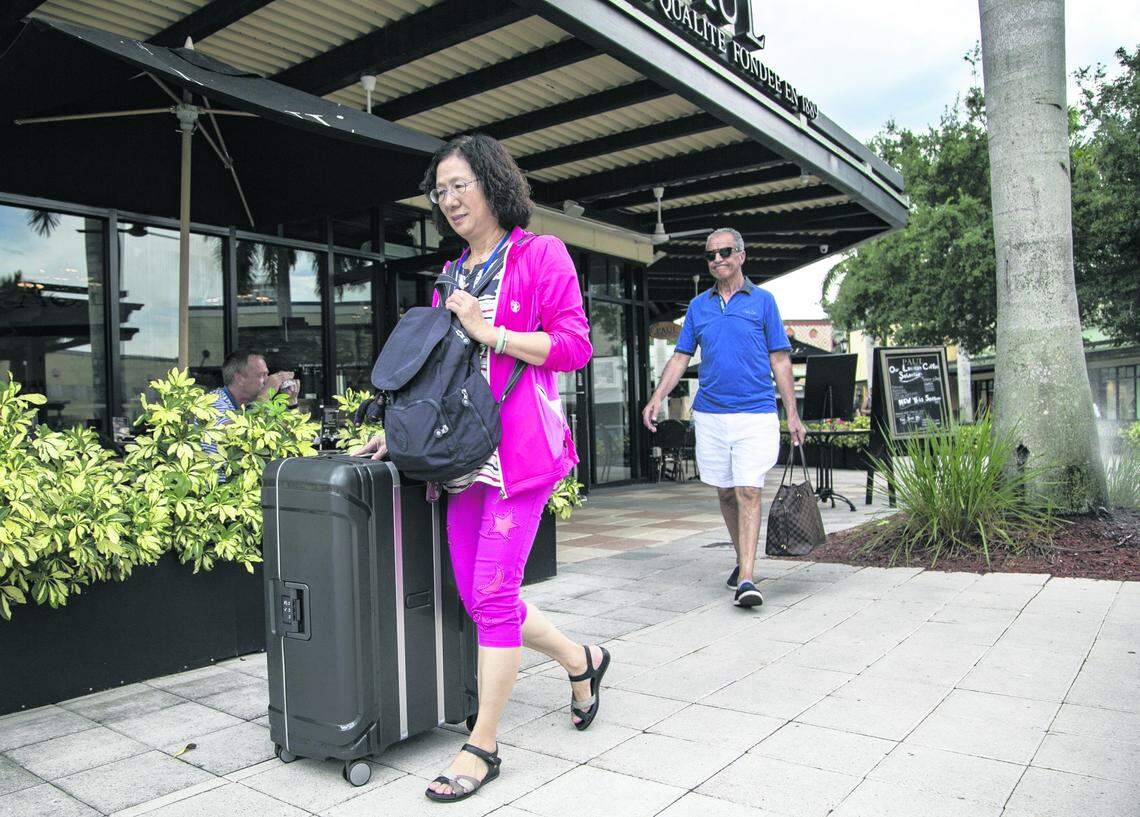 Many tourists buy suitcases to fill and take back to their country after shopping at Sawgrass Mills.