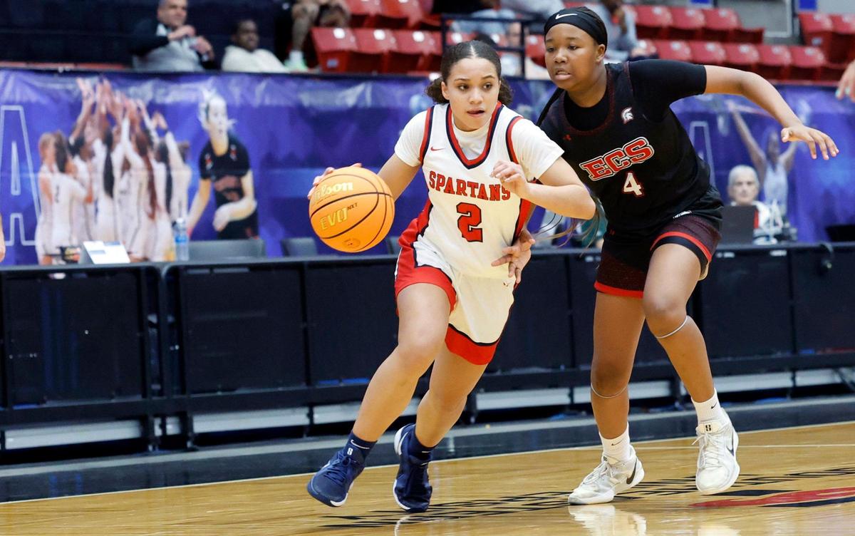 Miami Country Day’s Kori Edge (2) drives to the basket against Evangelical Christian’s Moriah Walker (4) in the second half during girls basketball state semifinal of the Florida High School State Championships at the RP Funding in Lakeland, Florida on Thursday, February 27, 2025.