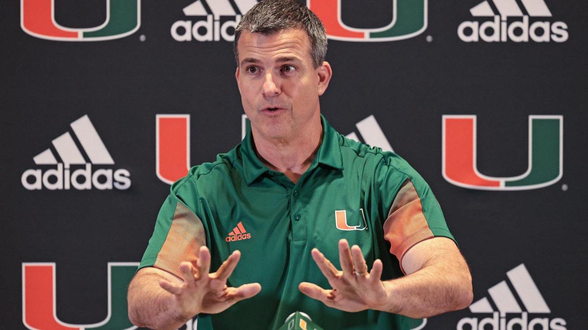 Miami Hurricanes coach Mario Cristobal wrapped up the first day of the three-day early signing period as he speaks to reporters during a press conference at the Bob Mann Auditorium Schwartz Center for Athletic Excellence in Coral Gables on Wednesday, December 15, 2021.