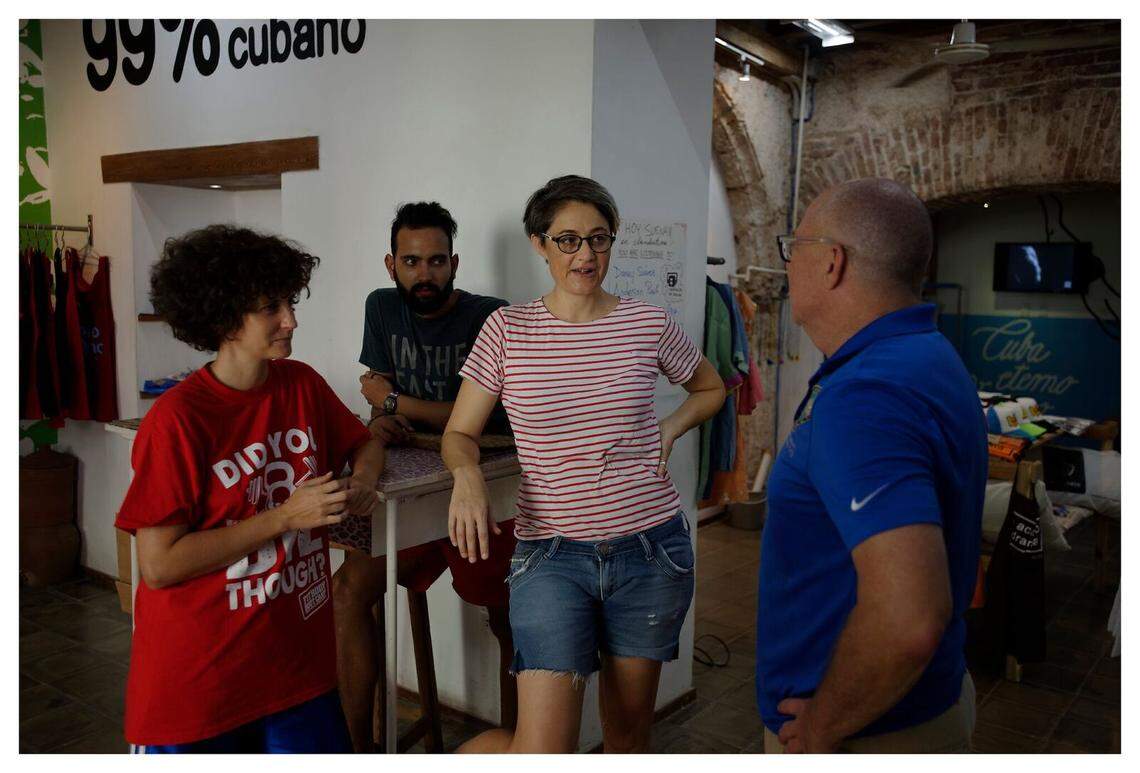 David Richardson, right, visits Clandestina, a jewelry and clothing store in Havana.