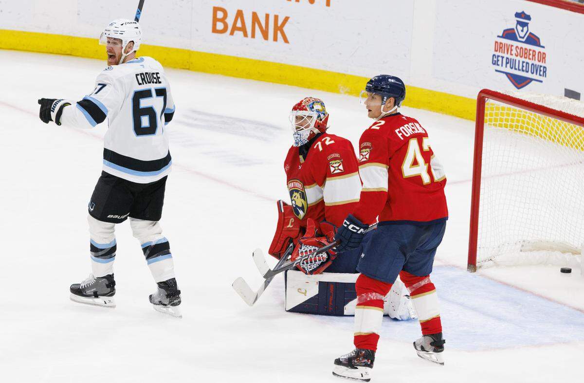 Utah Mammoth left wing Lawson Crouse (67) reacts to his teammate scoring on Florida Panthers goaltender Sergei Bobrovsky (72) during the third period of a game on Tuesday, Jan. 27, 2026, at Amerant Bank Arena in Sunrise, Fla. The Utah Mammoth beat the Florida Panthers 4-3.