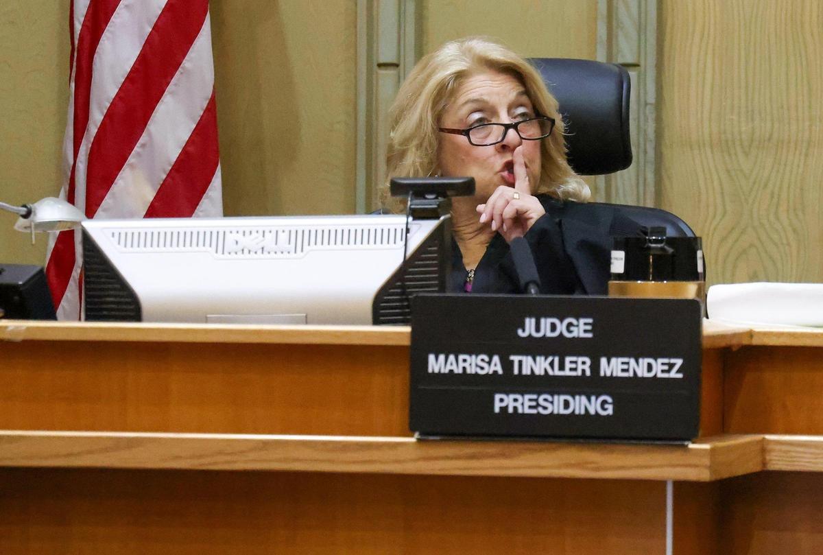Judge Marisa Tinkler Mendez gestures as Dale Ewers continued to interrupt the presiding during his hearing in courtroom 4-6 inside the Richard E. Gerstein Justice Building in Miami, Florida, on Tuesday, December 19, 2023.