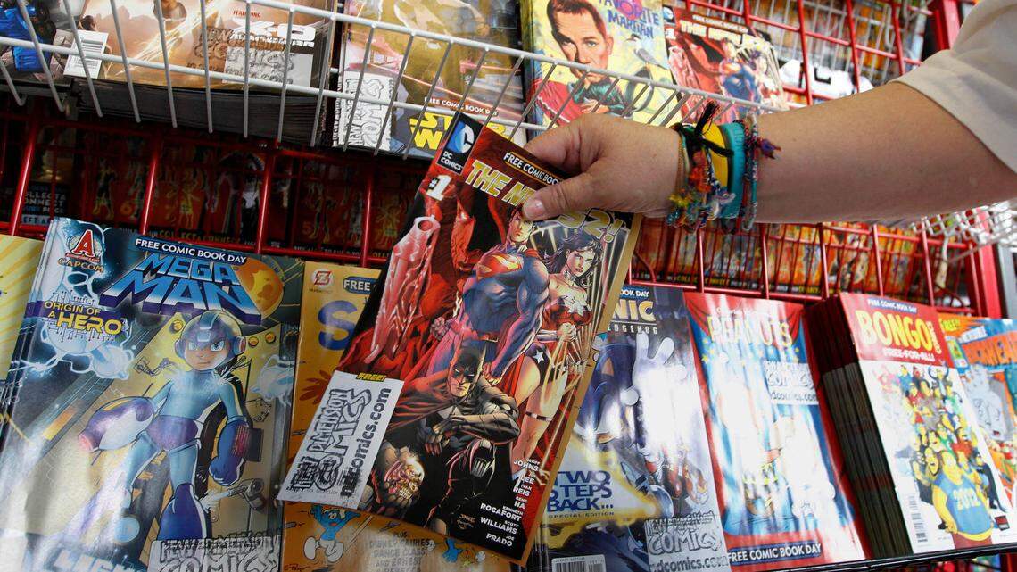 A fan looks at the display rack at a Pennsylvania comic book store on Free Comic Book Day.
