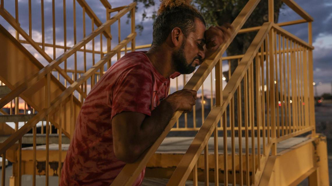 Venezuelan Luis Oswaldo, 39, who was left stranded at La Quinta after he missed the charter bus, contemplates his future. “They left and that was it. They didn’t give out more food. I have water from the lobby. I’m ‘eating’ water now.” About twenty migrants (mostly men) boarded a charter bus back to the Migrant Resource Center after their flight out of San Antonio, Texas was canceled on Tuesday, September 20, 2022.