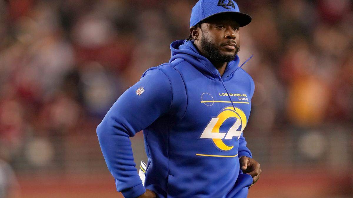 FILE - Los Angeles Rams running backs coach Thomas Brown is shown during an NFL football game against the San Francisco 49ers in Santa Clara, Calif., Monday, Nov. 15, 2021. Brown was a five-star running back destined for the University of Georgia back then in the early 2000s, his mind focused on the Bulldogs and the NFL. He hadn’t even imagined trading in his cleats for a whistle — “I was adamant about not being a coach,” he says with a grin.(AP Photo/Tony Avelar, File)