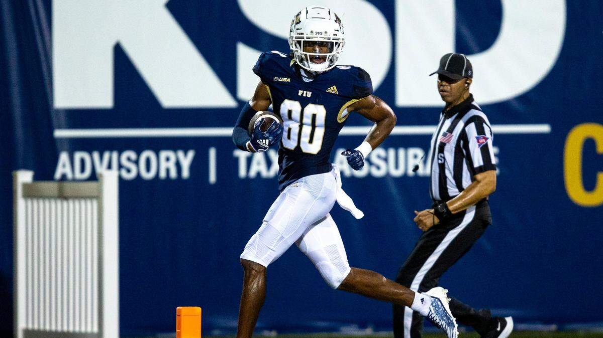 Florida International University wide receiver Kris Mitchell (80) scores a touchdown during the fourth quarter of an NCAA Conference USA football game against Bryant University at Riccardo Silva Stadium in Miami, Florida, on Thursday, September 1, 2022.