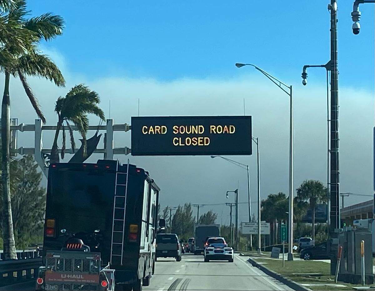 Brush fires forced officials to shut down Card Sound Road and U.S. 1 into and out of the Florida Keys from Miami-Dade. Dry weather to blame.