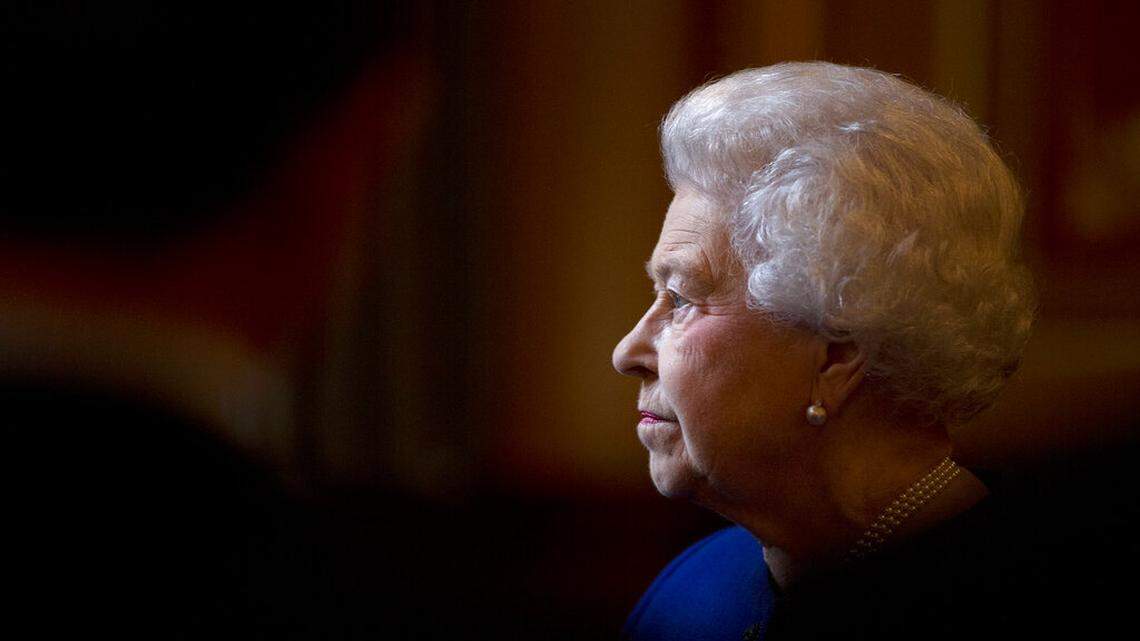 In this Dec. 18, 2012 file photo Britain’s Queen Elizabeth II escorted by British Foreign Secretary William Hague, unseen, tours The Foreign and Commonwealth Office during an official visit which is part of her Jubilee celebrations in London. Queen Elizabeth II died on Sept. 8, 2022.