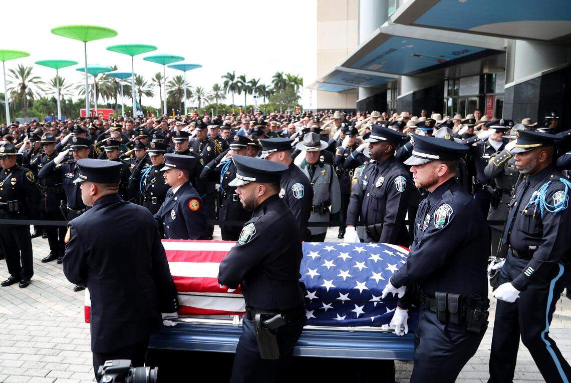 The casket of fallen Hollywood police officer Yandy Chirino is carried out for a full honors presentation on Nov. 1, 2021, at FLA Live Arena in Sunrise. Chirino, 28, was shot and killed after responding to a call of a suspicious person in the Emerald Hills neighborhood in Hollywood on Oct. 17.