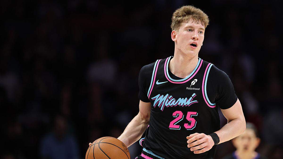 Kasparas Jakucionis #25 of the Miami Heat controls the ball against the Oklahoma City Thunder during the first half at Kaseya Center on January 17, 2026 in Miami.
